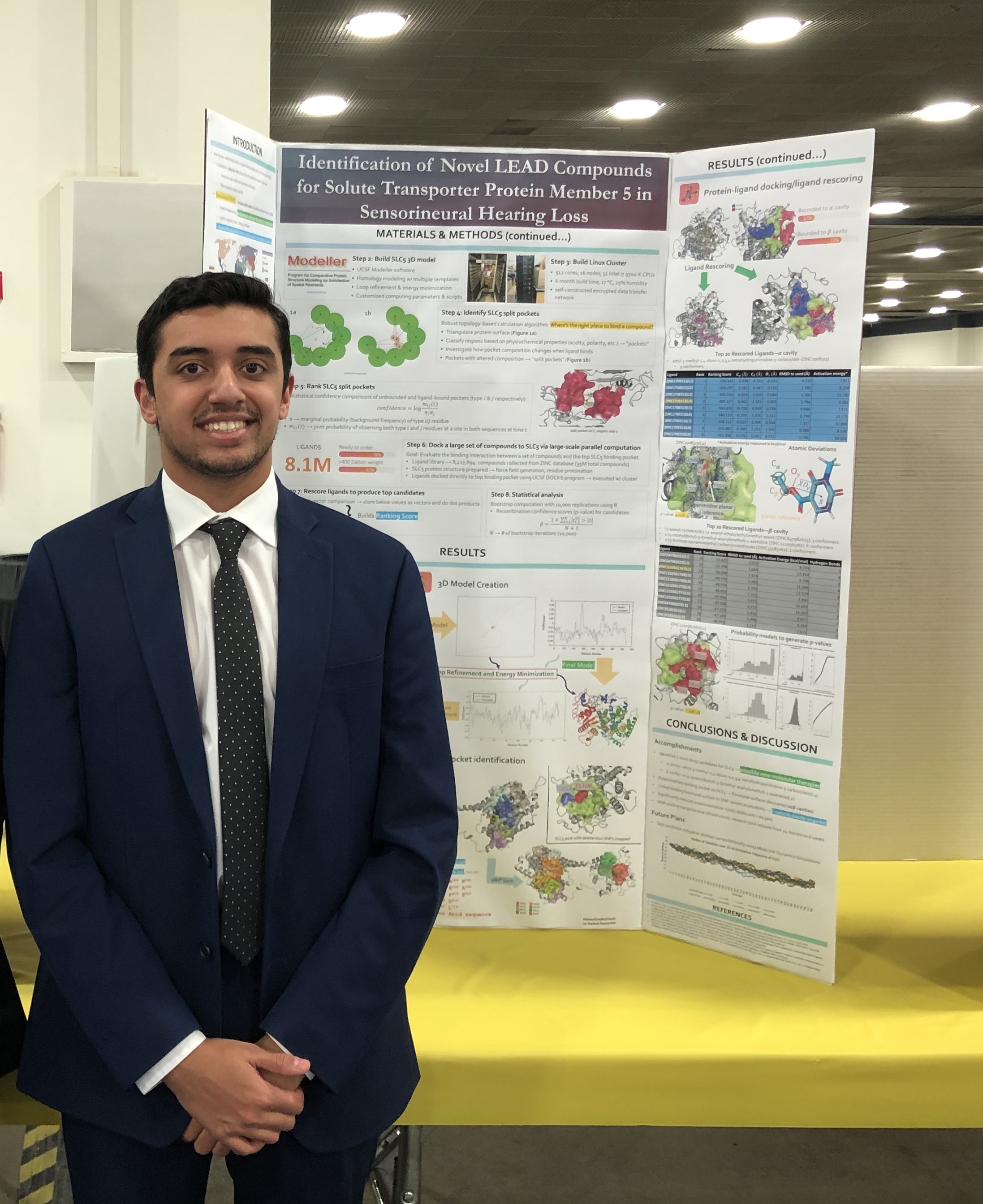 Saaim presenting a research poster in 2020